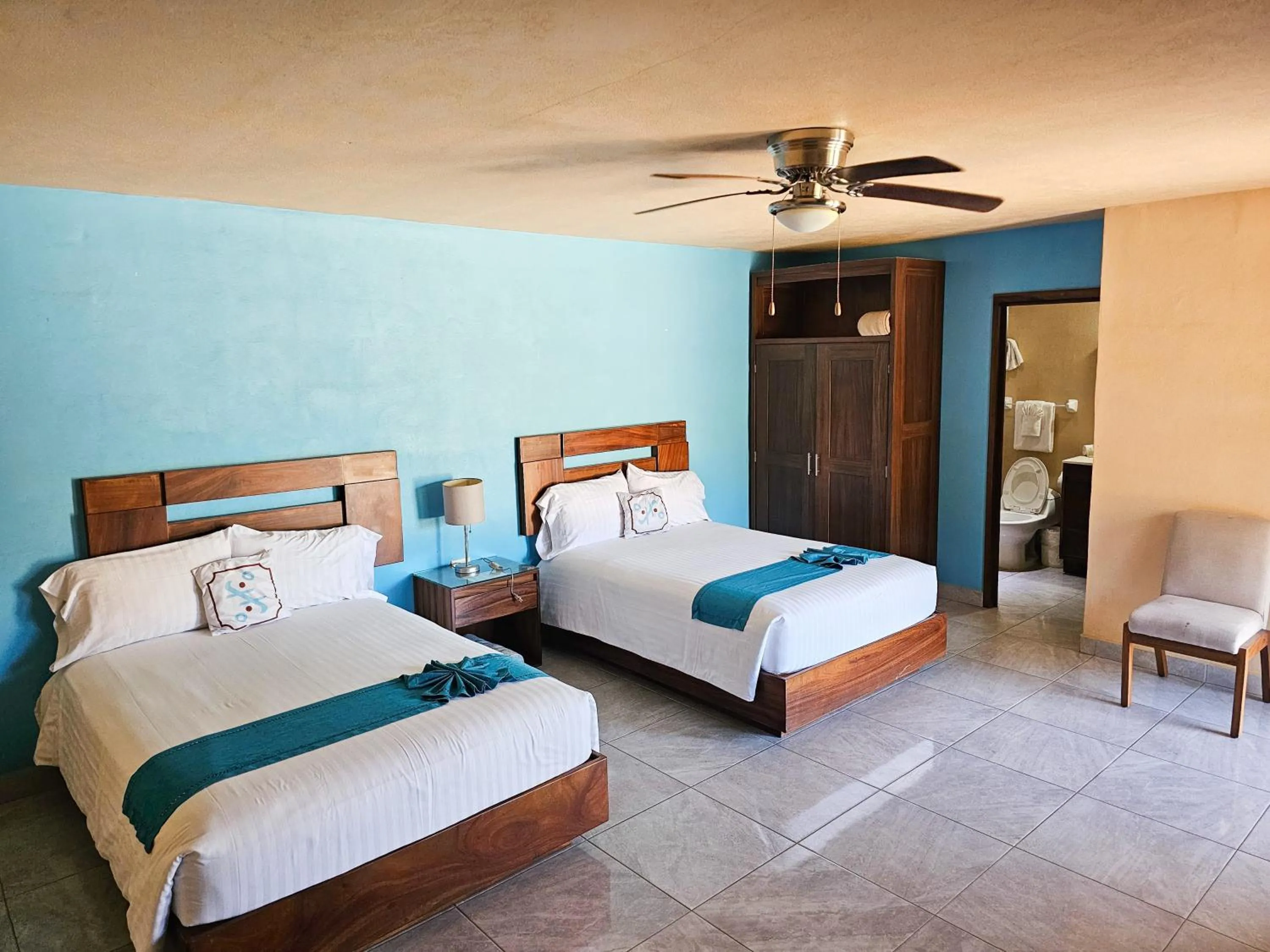 Bed in Pacific Inn hotel