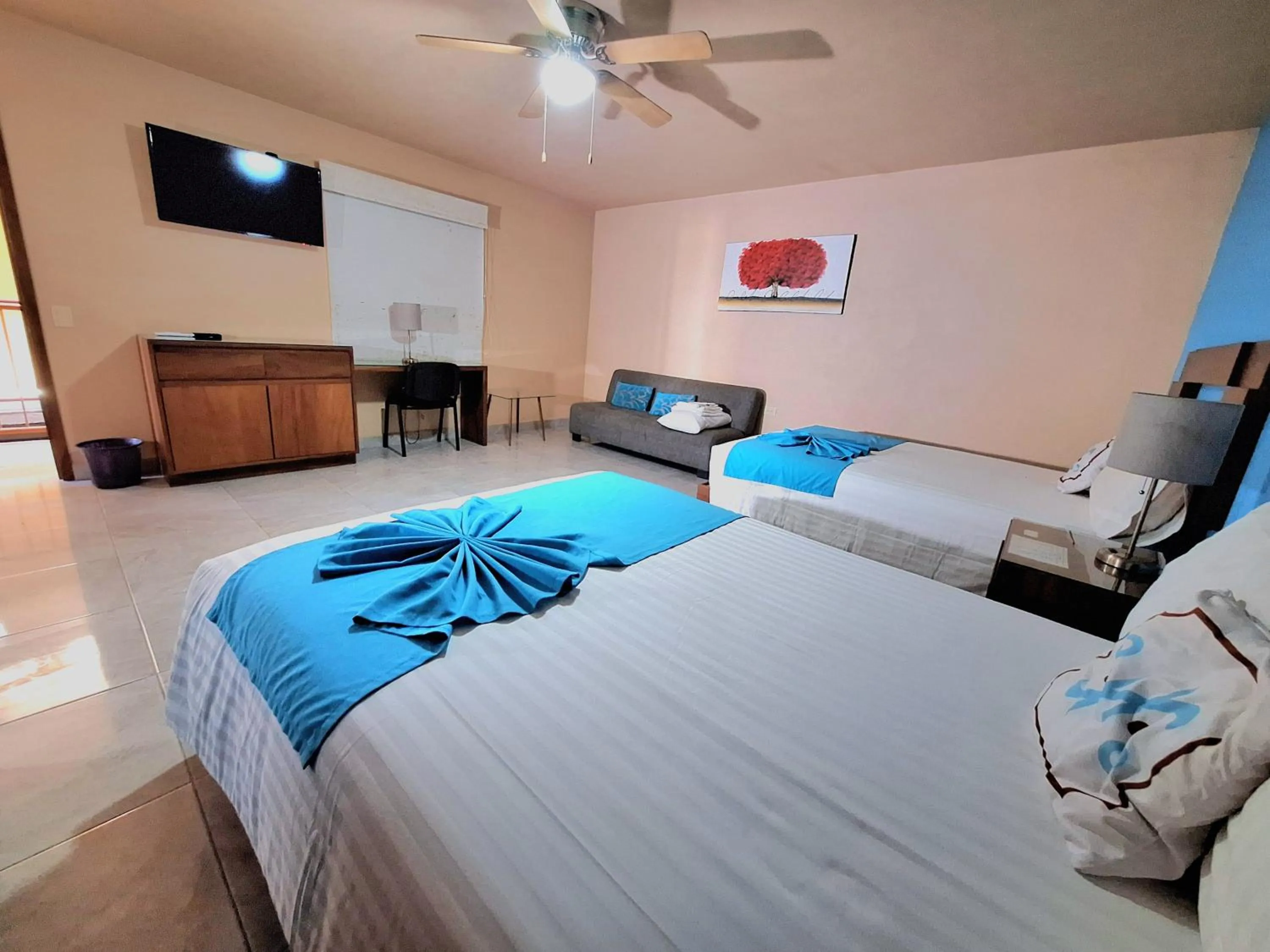 Bed in Pacific Inn hotel