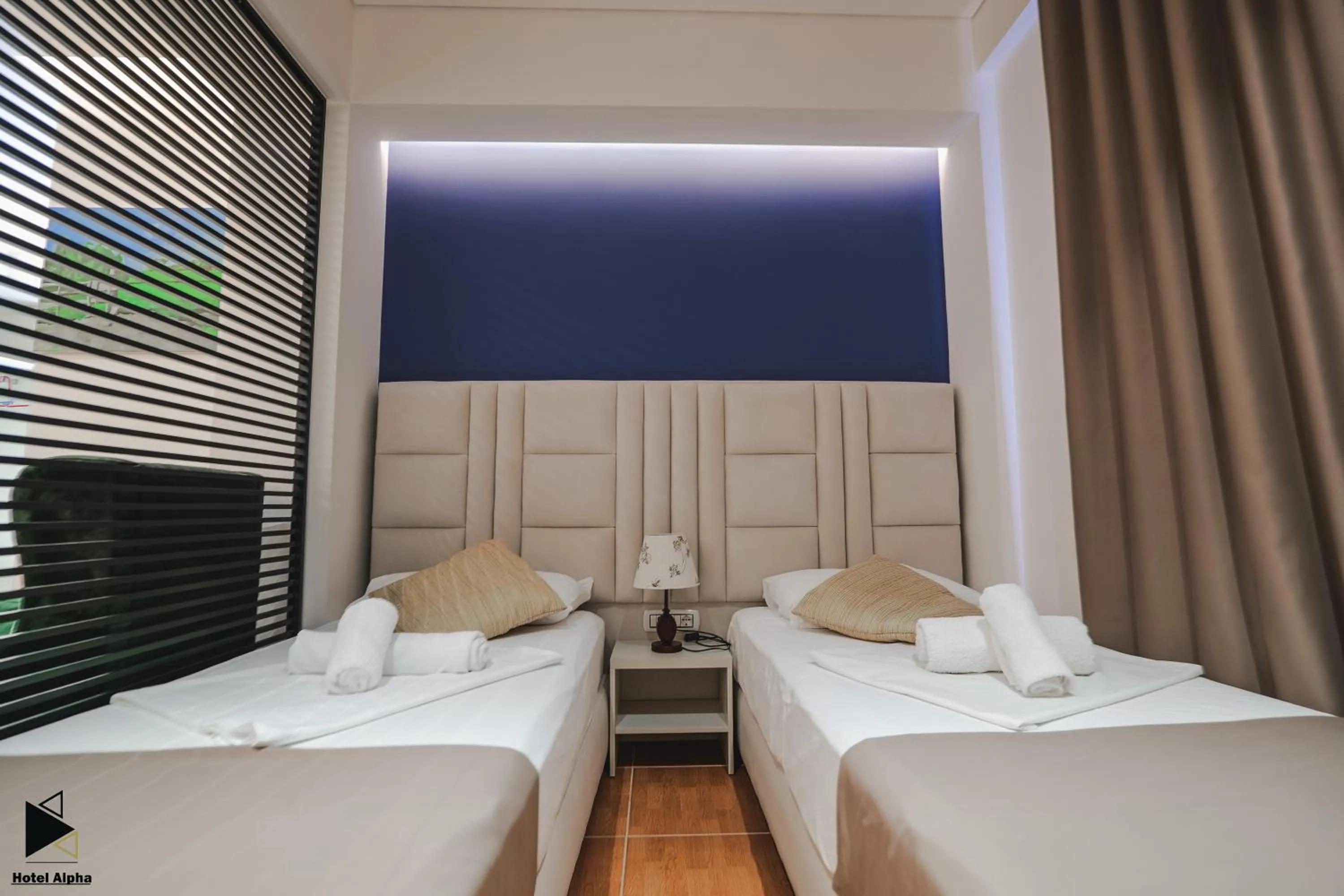 Bathroom, Bed in Hotel Alpha