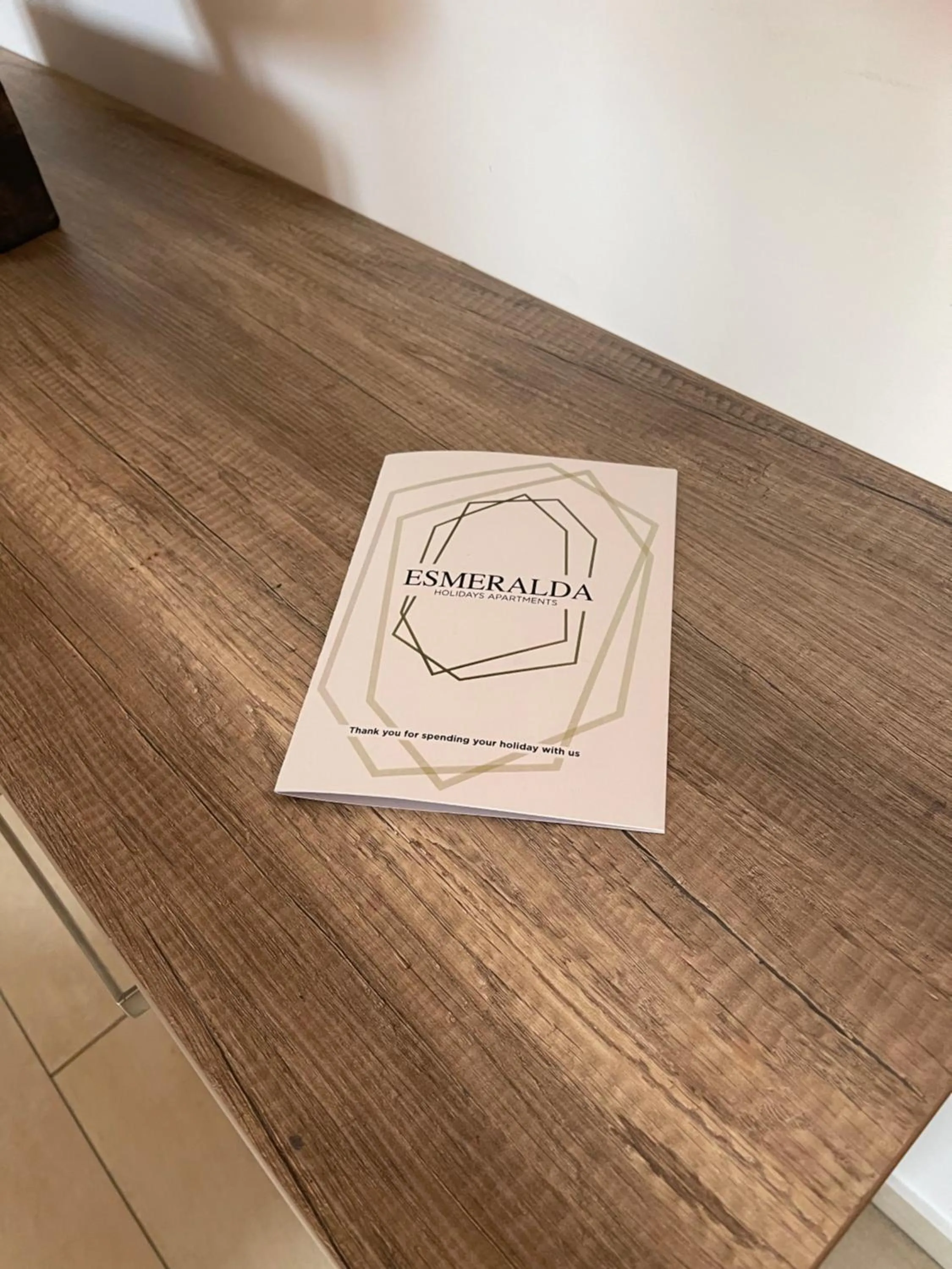 Property logo or sign in Esmeralda Holidays Apartments