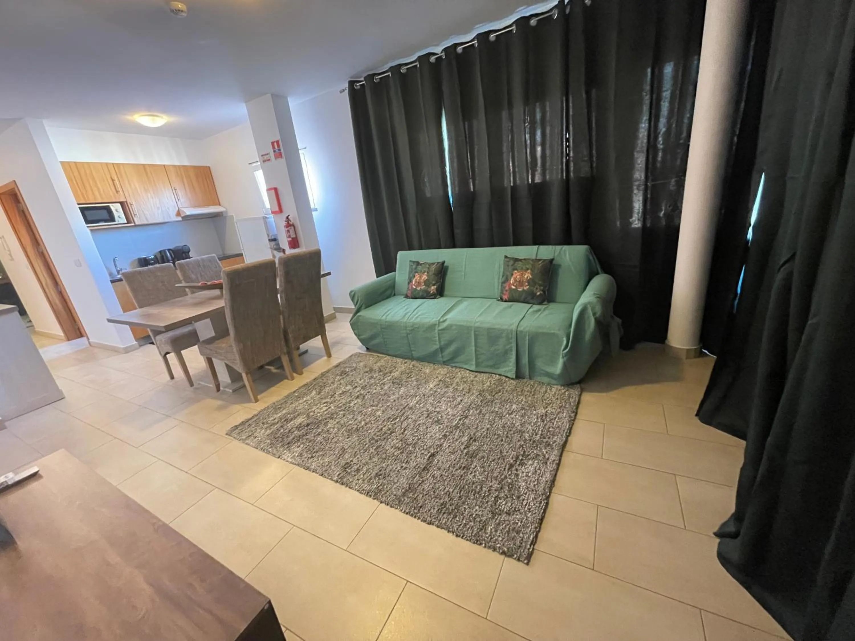 Living room in Esmeralda Holidays Apartments