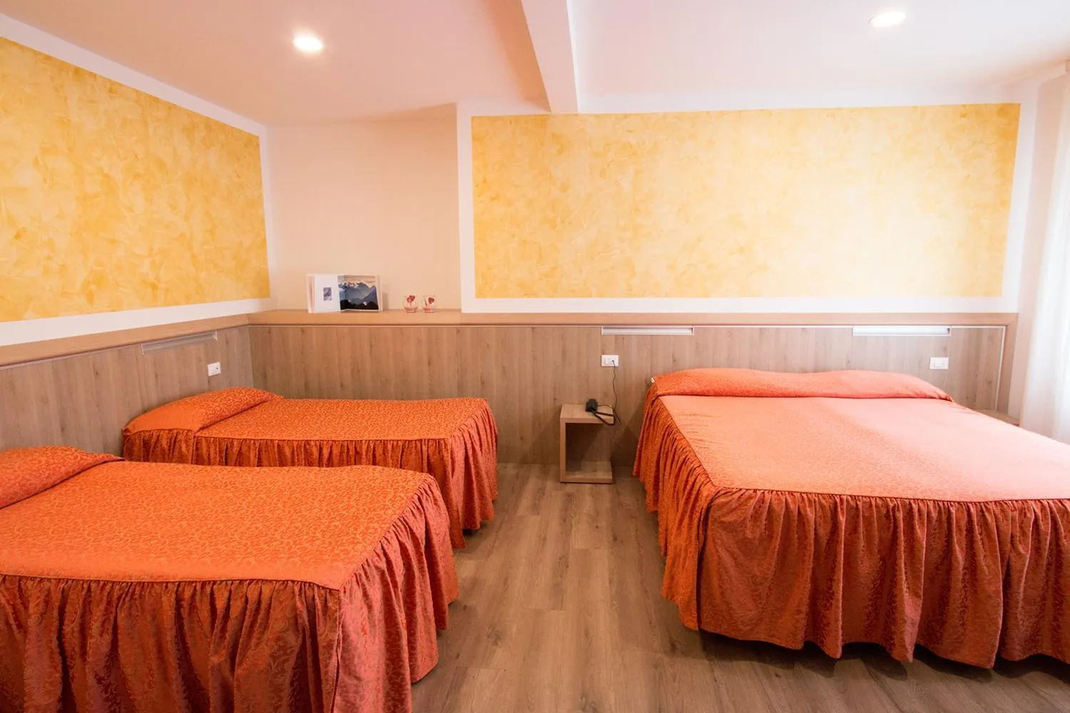 Bed in Al Benvenuto Hotel & Restaurant