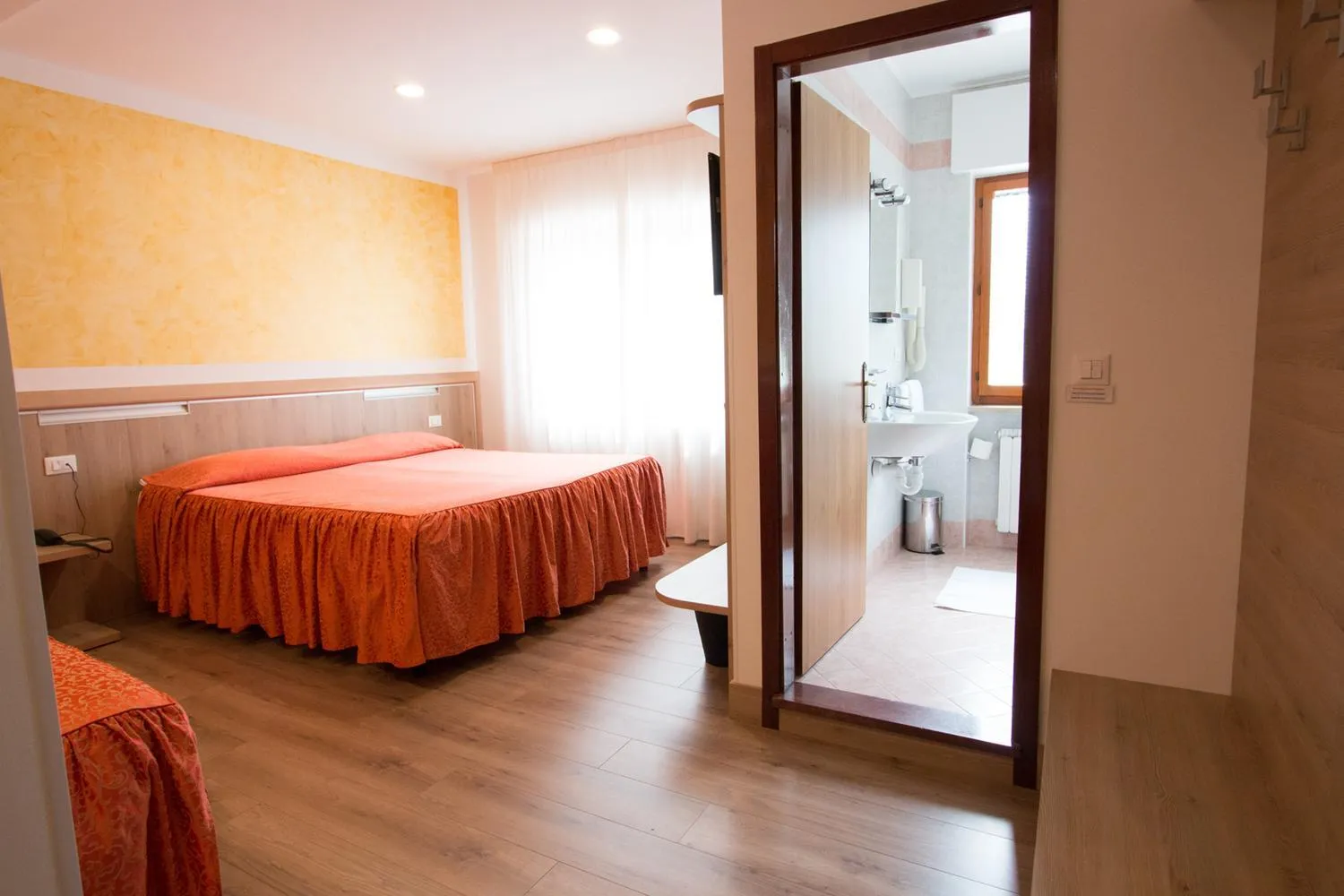 Bed in Al Benvenuto Hotel & Restaurant