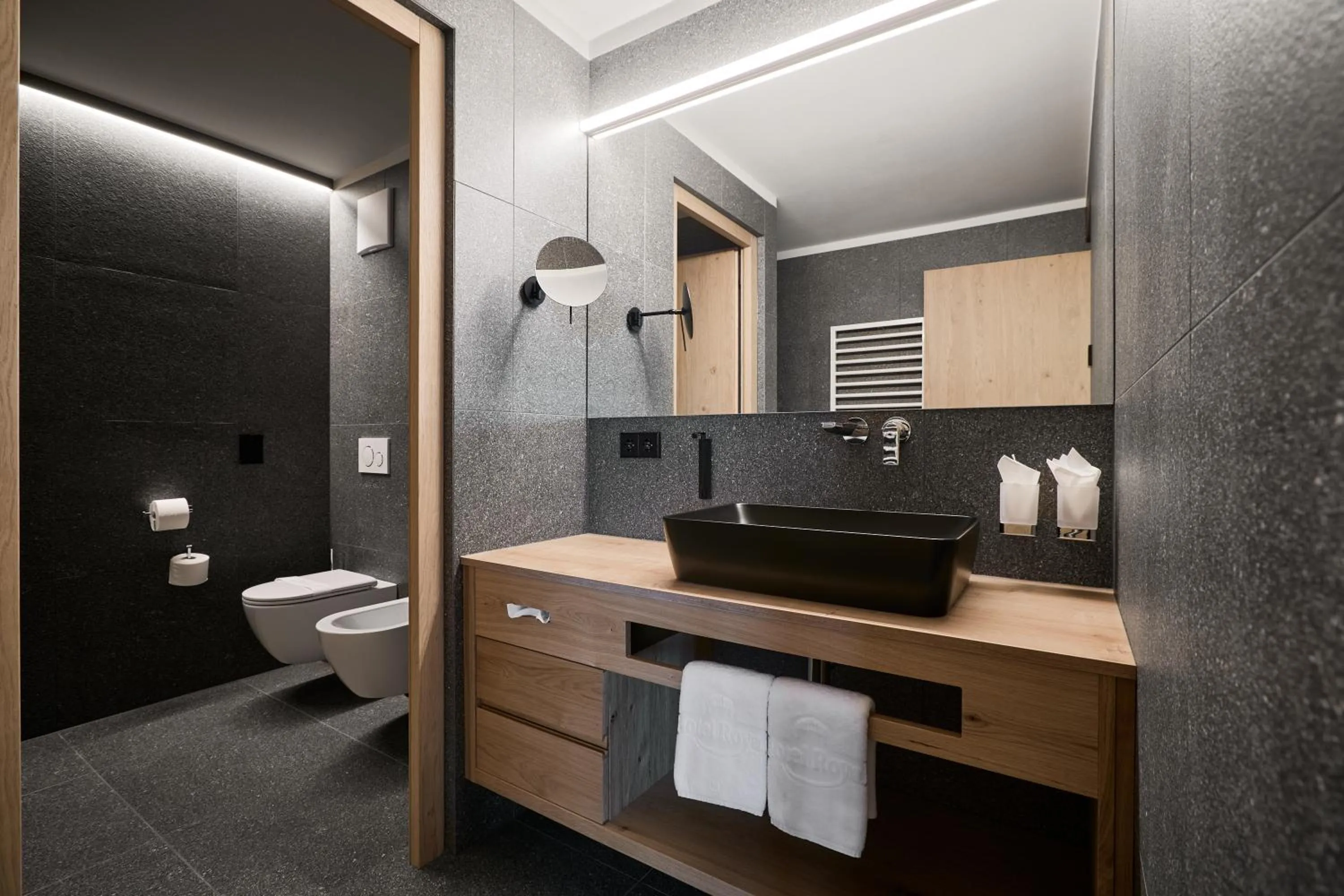 Bathroom in Hotel DAS ROYAL in Obereggen