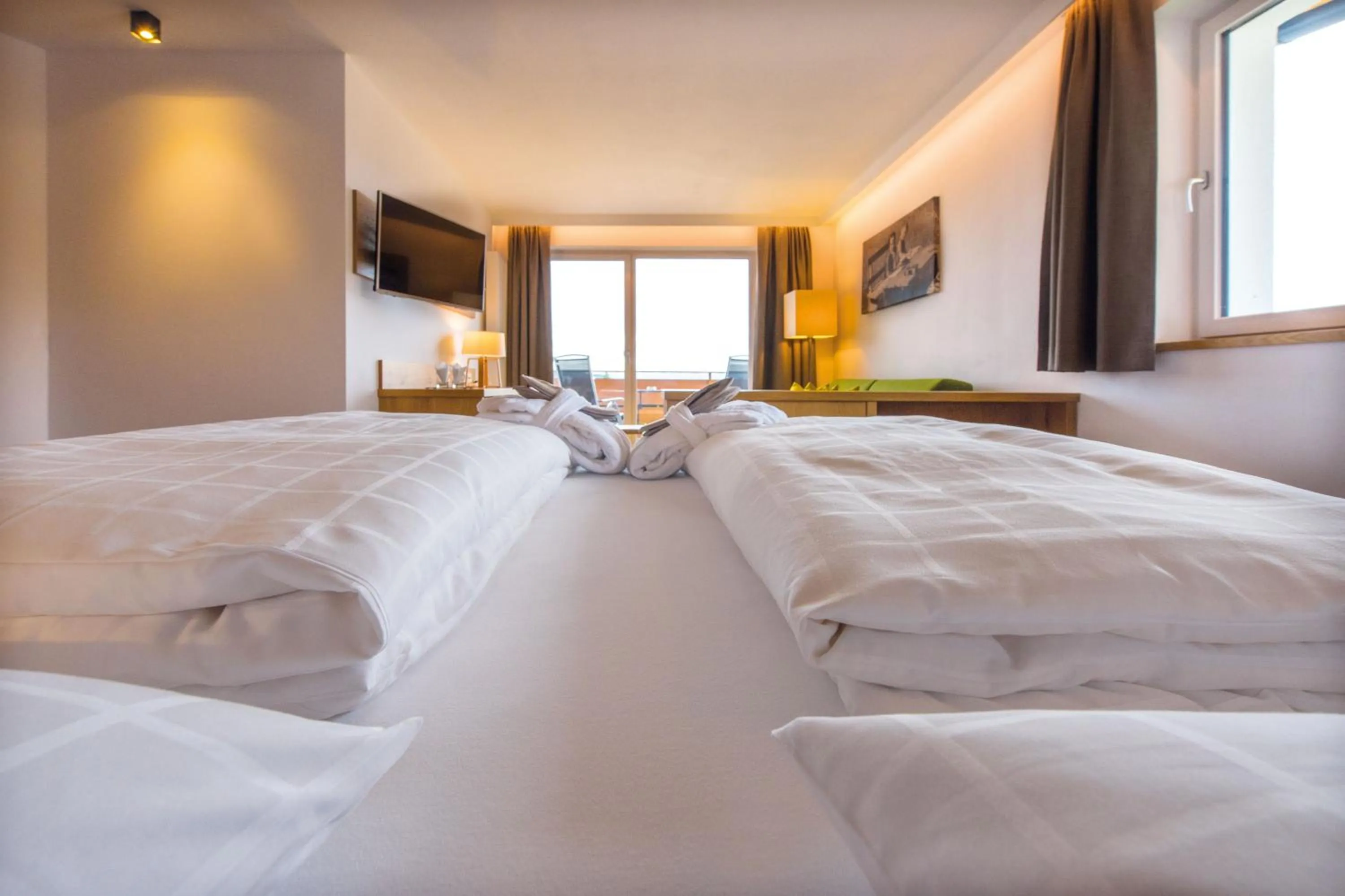 Photo of the whole room, Bed in Hotel DAS ROYAL in Obereggen