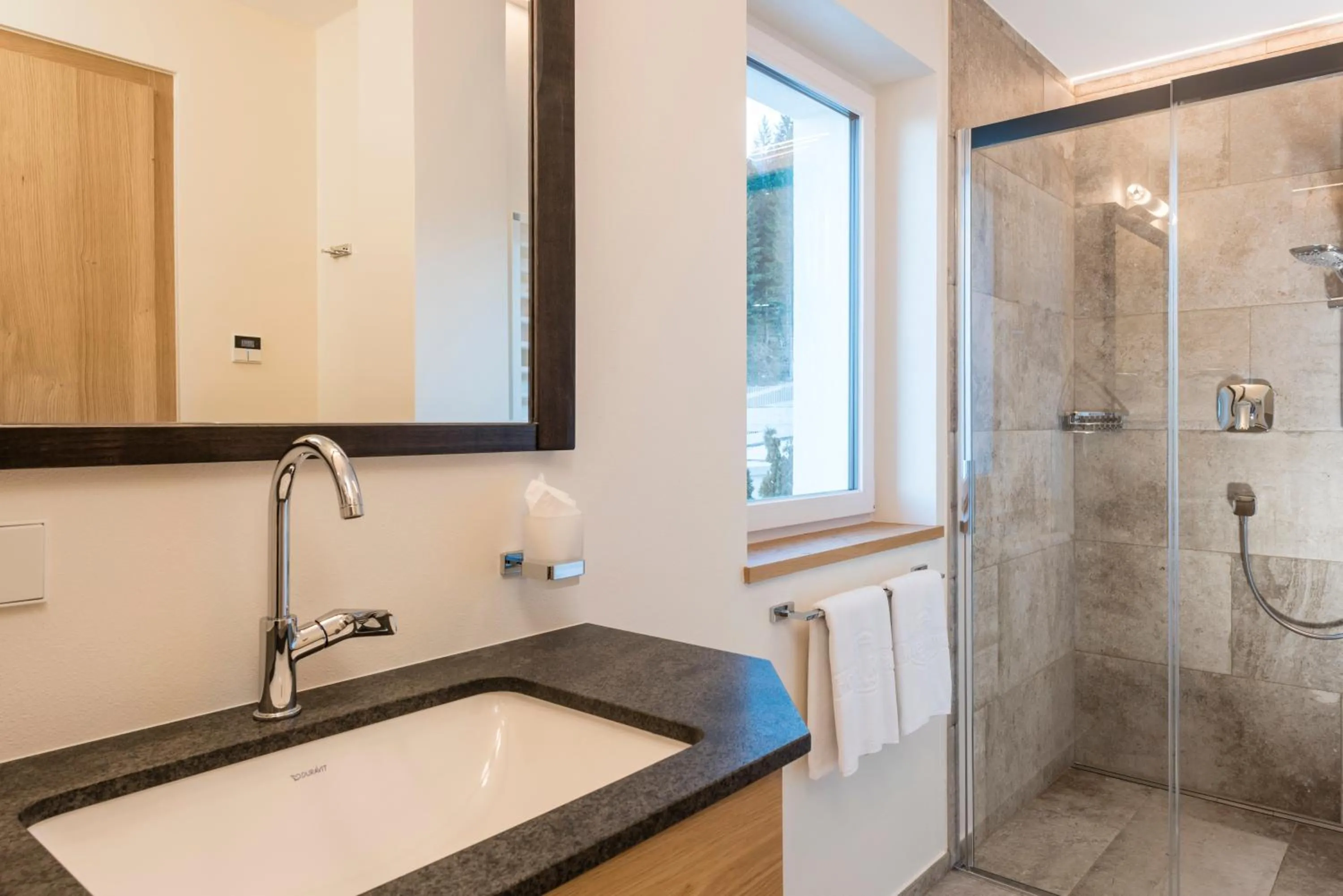 Bathroom in Hotel DAS ROYAL in Obereggen