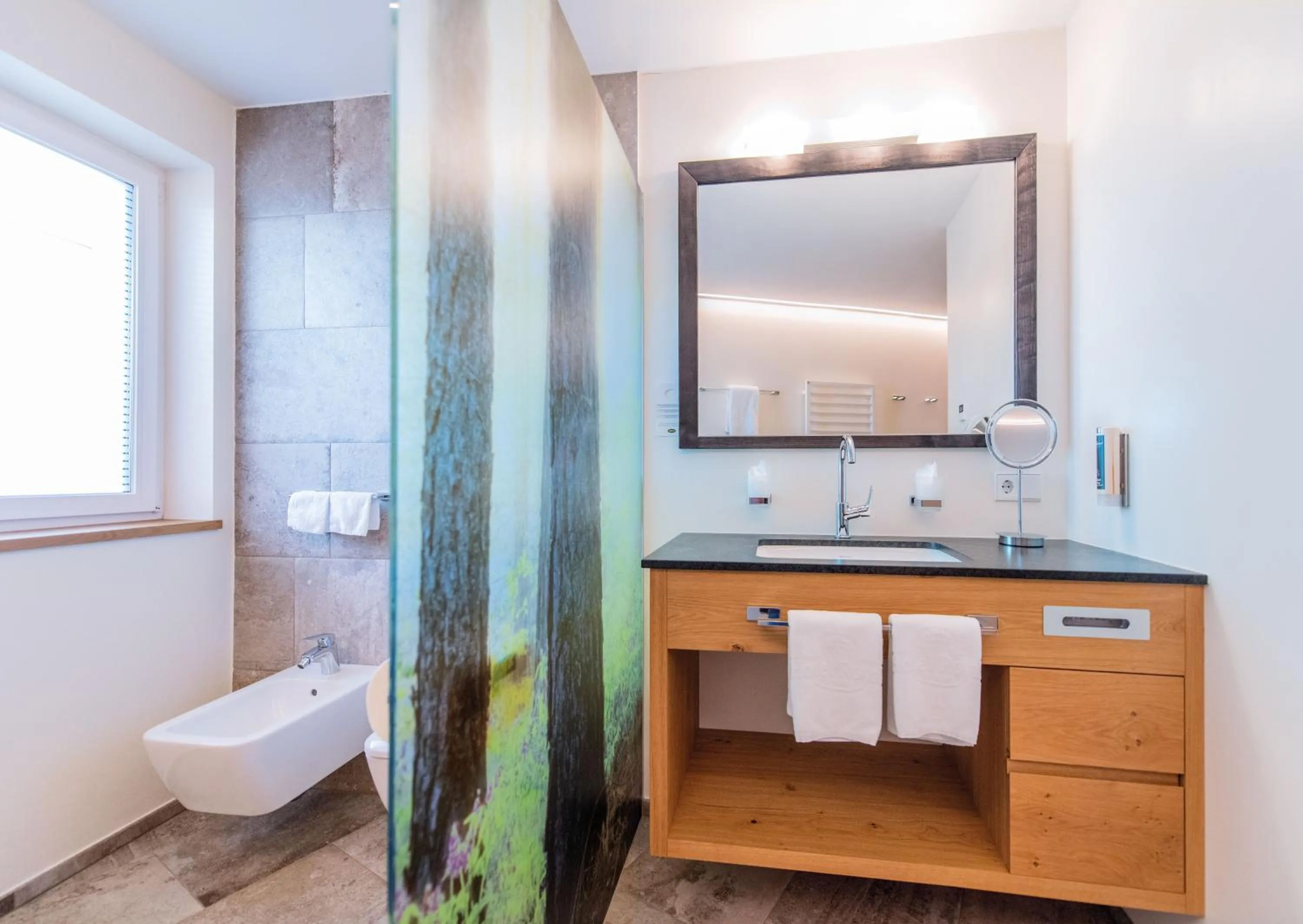 Bathroom in Hotel DAS ROYAL in Obereggen