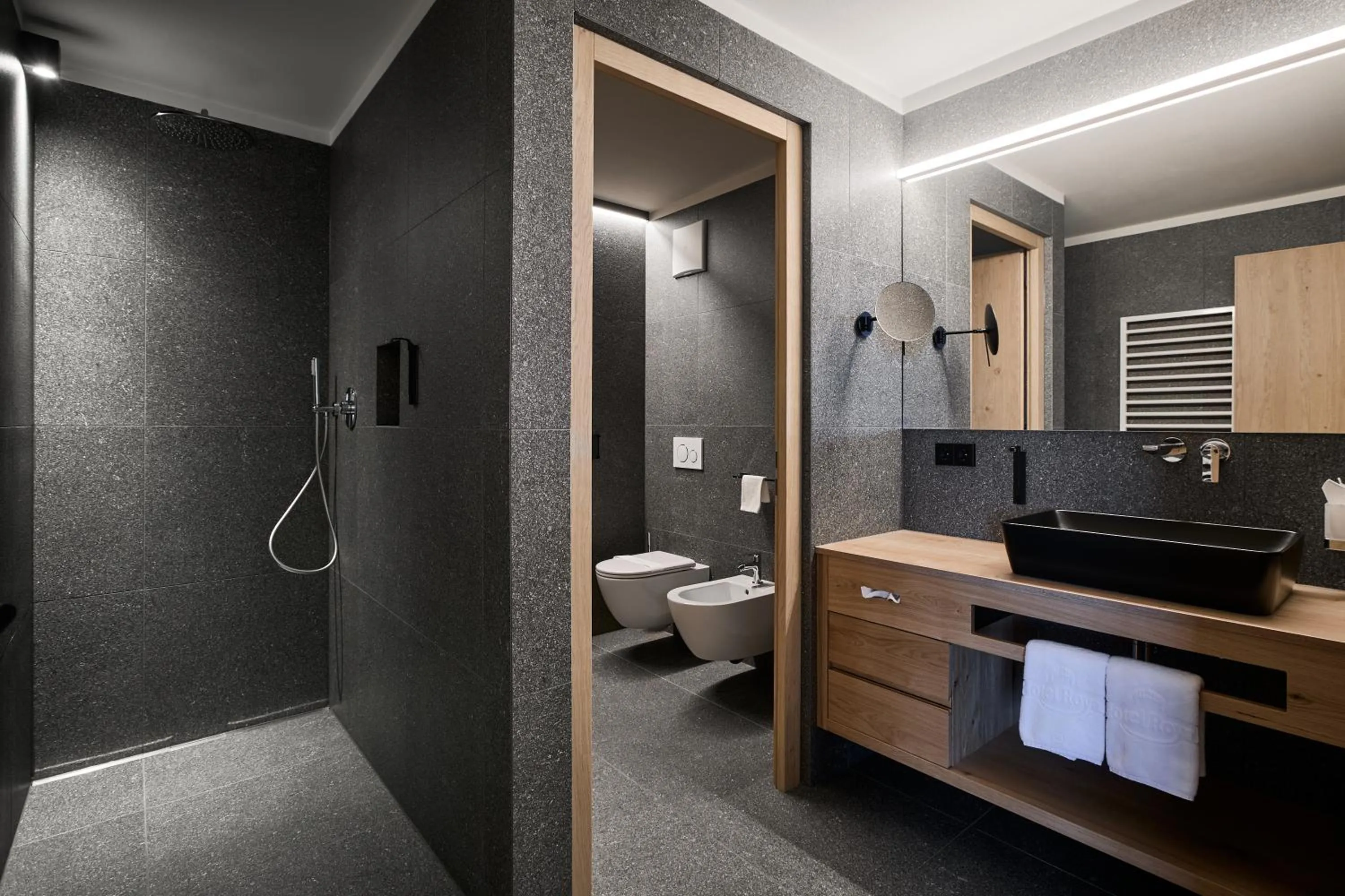 Bathroom in Hotel DAS ROYAL in Obereggen