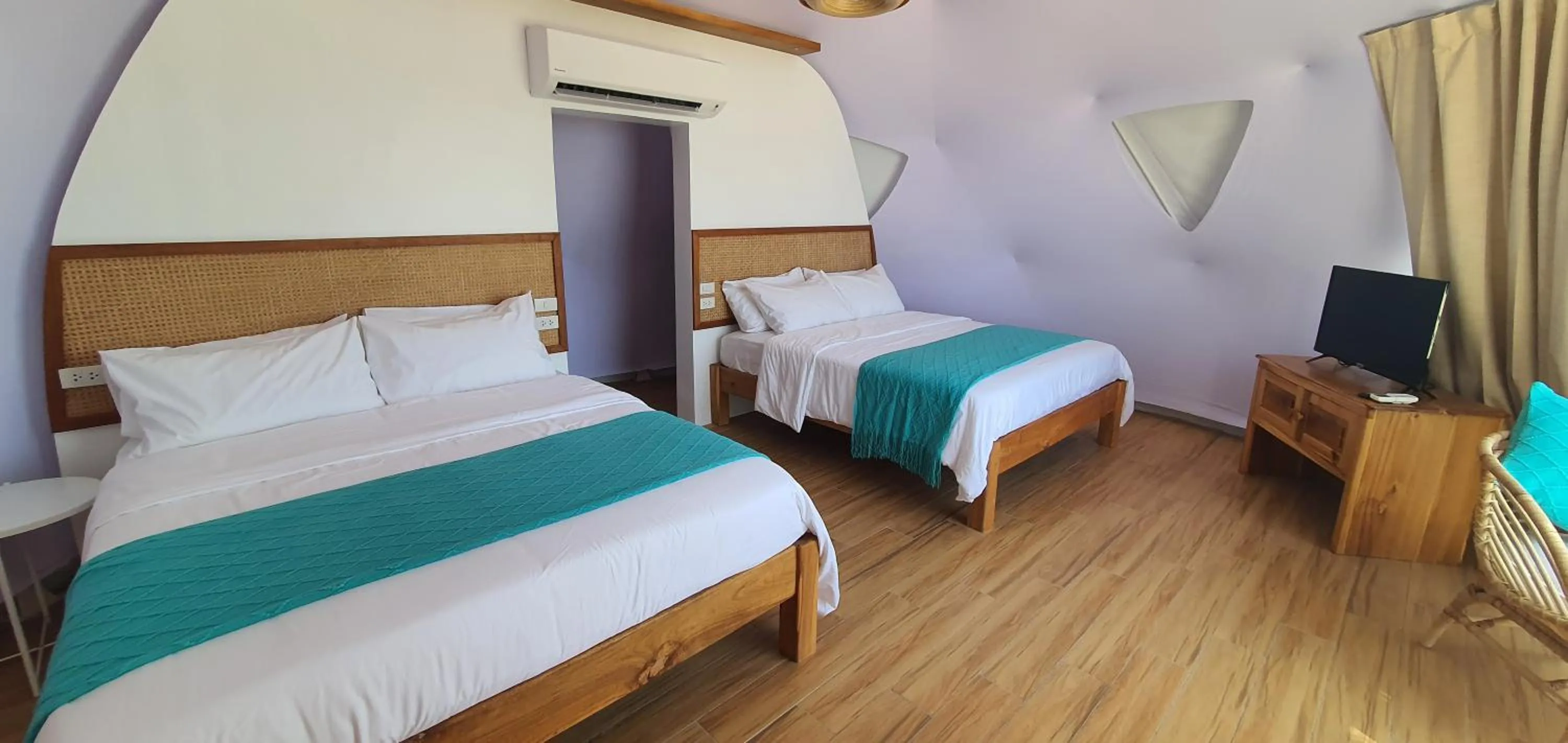 Bed in Malipaya Villas