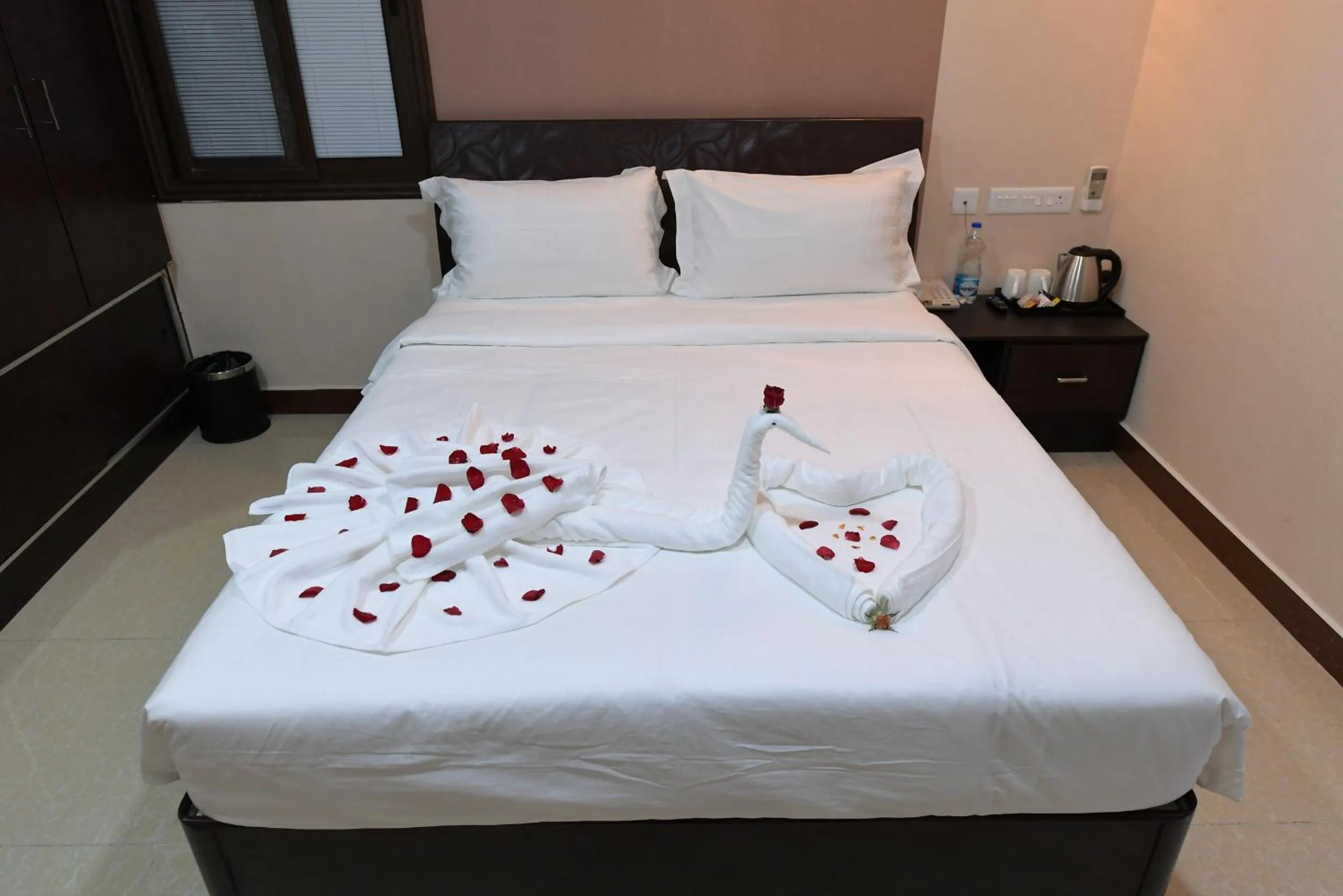 Bed in Coastal Grand Hotel Sampath