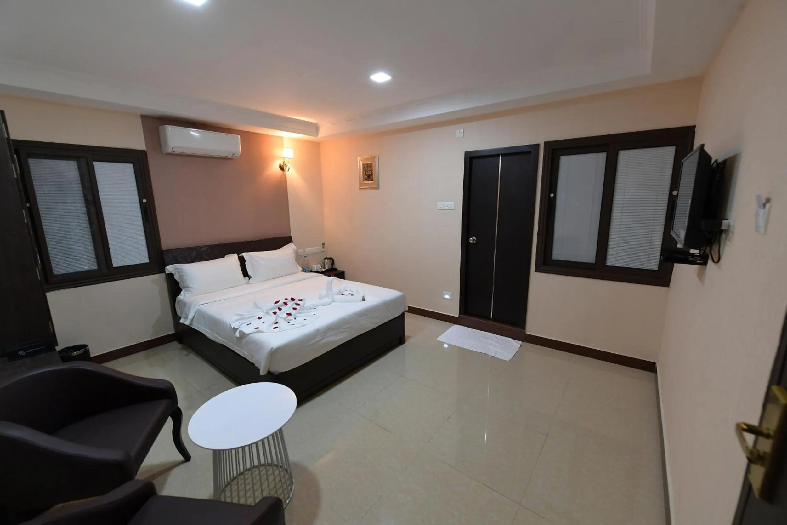 Bed in Coastal Grand Hotel Sampath