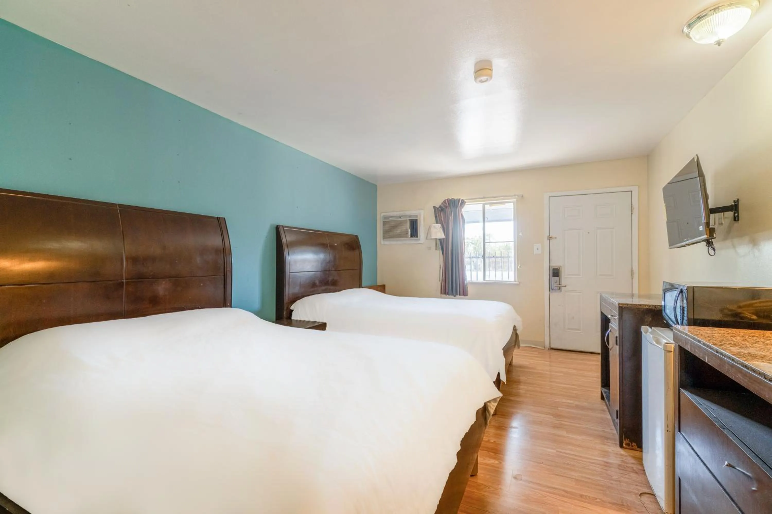 Bedroom, Bed in American Inn by OYO Colorado City I-20