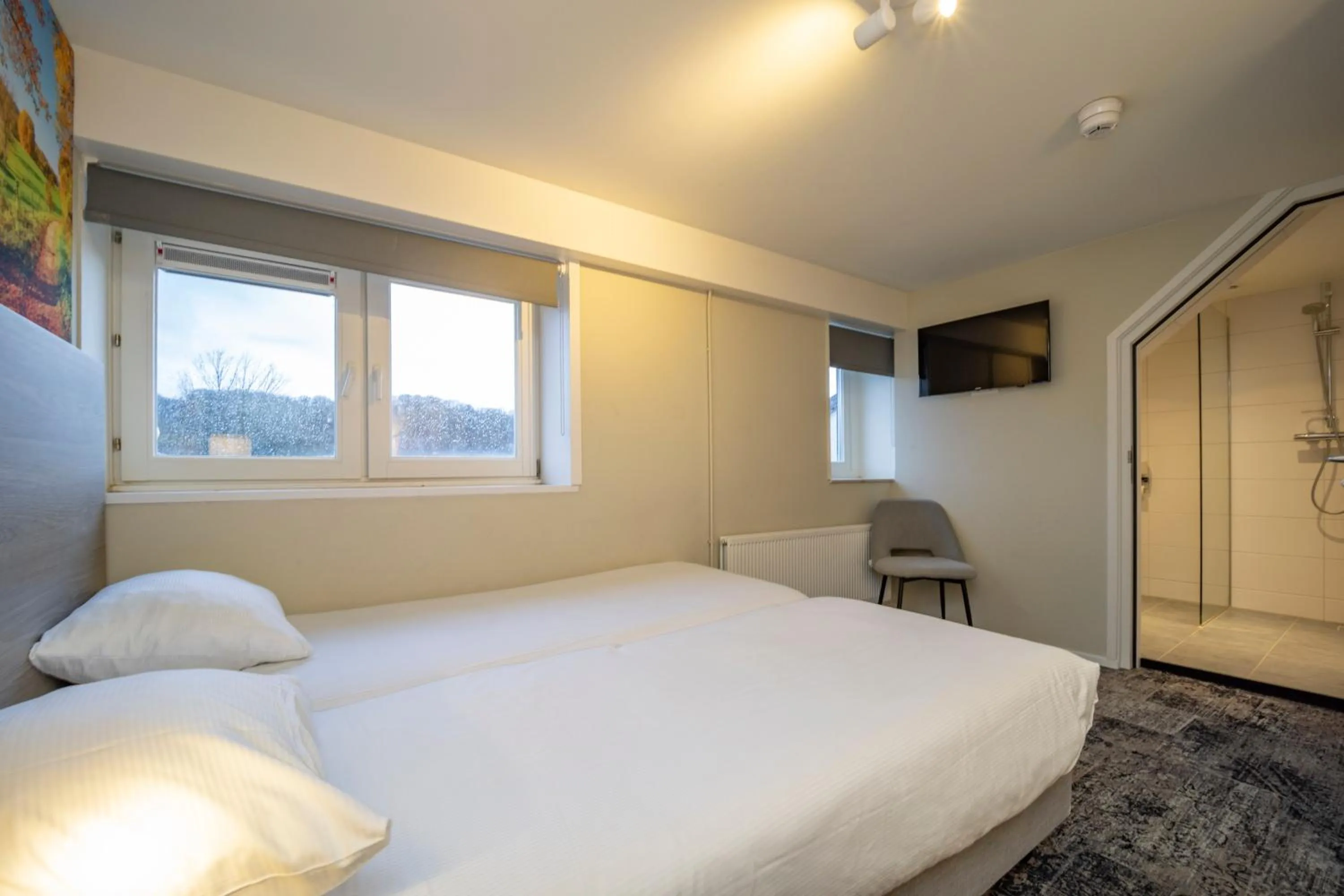 Bedroom, Bed in Fletcher Hotel Restaurant De Geulvallei