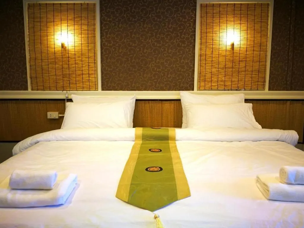 Bed in THOUSAND-TEN THOUSAND HOTEL