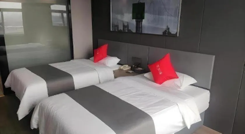 Bed in Thank Hotel Shandong Linyii Pingyi County Commerce and Trade City
