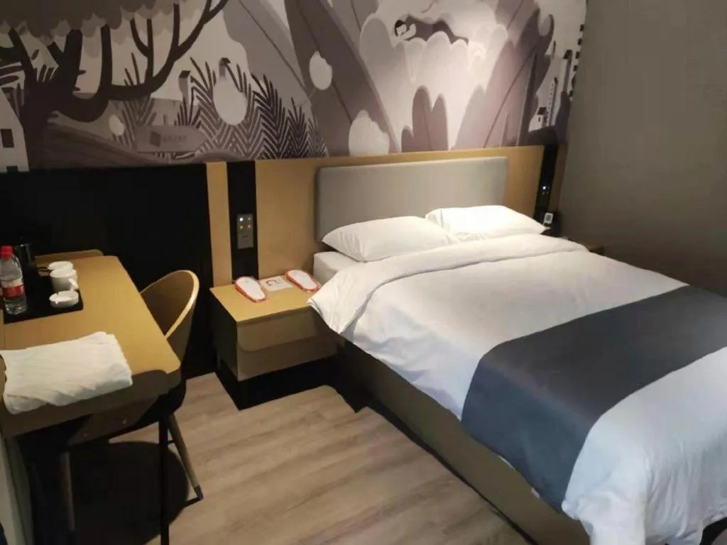 Bed in Thank Hotel Shandong Linyii Pingyi County Commerce and Trade City