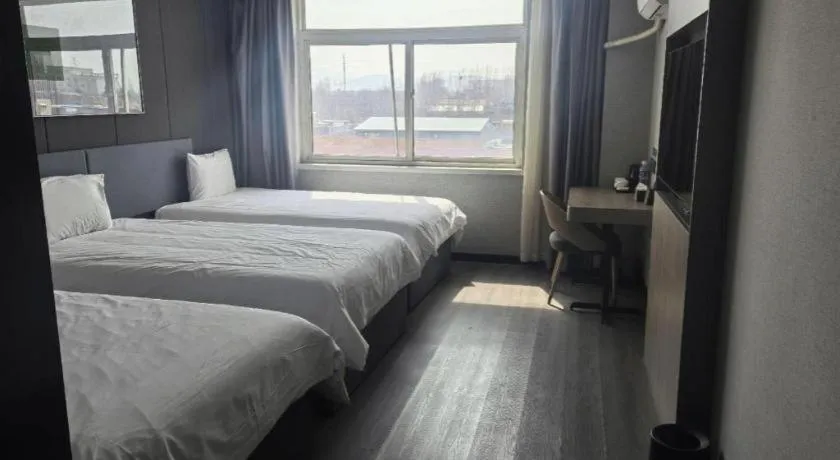 Bed in Thank Hotel Shandong Linyii Pingyi County Commerce and Trade City