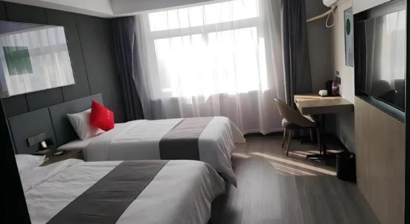 Bed in Thank Hotel Shandong Linyii Pingyi County Commerce and Trade City