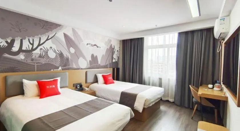 Bed in Thank Hotel Shandong Linyii Pingyi County Commerce and Trade City