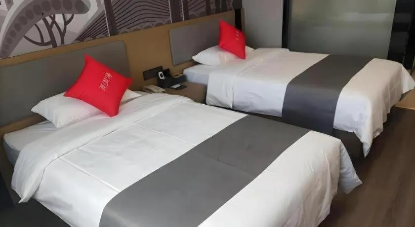 Bed in Thank Hotel Shandong Linyii Pingyi County Commerce and Trade City