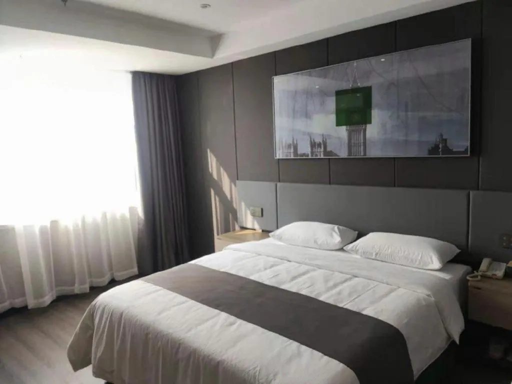 Bed in Thank Hotel Shandong Linyii Pingyi County Commerce and Trade City