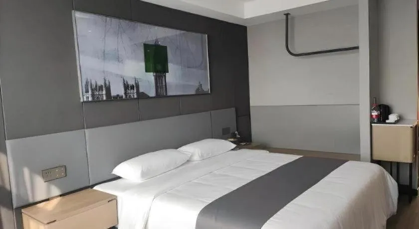 Bed in Thank Hotel Shandong Linyii Pingyi County Commerce and Trade City