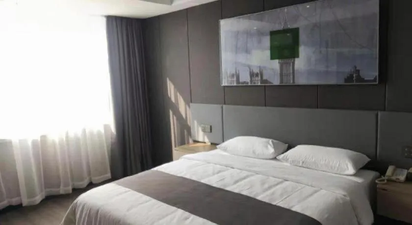 Bed in Thank Hotel Shandong Linyii Pingyi County Commerce and Trade City