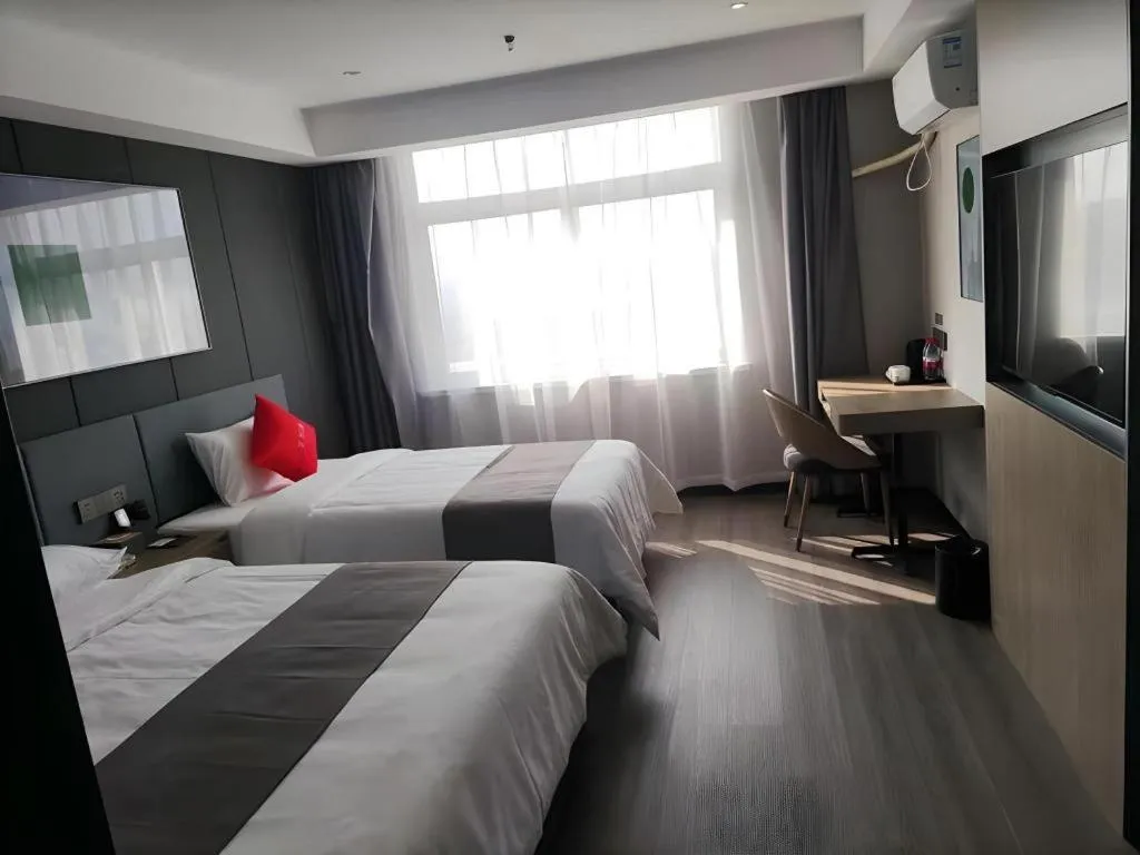 Bed in Thank Hotel Shandong Linyii Pingyi County Commerce and Trade City