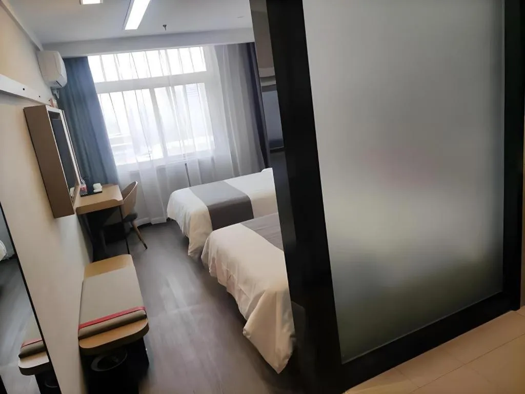 Bed in Thank Hotel Shandong Linyii Pingyi County Commerce and Trade City