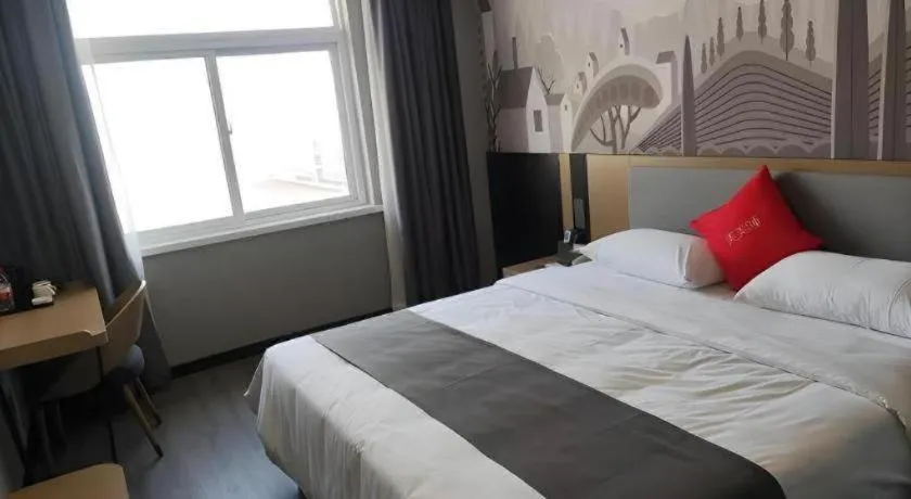 Bed in Thank Hotel Shandong Linyii Pingyi County Commerce and Trade City