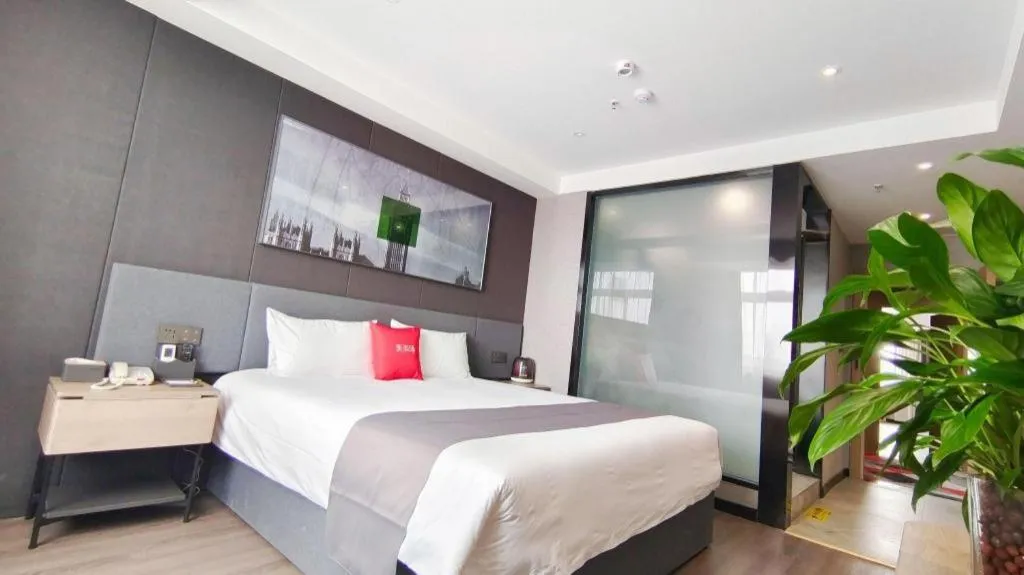 Bed in Thank Hotel Shandong Linyii Pingyi County Commerce and Trade City