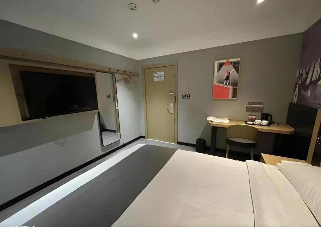 Bed in Thank Hotel Shandong Linyii Pingyi County Commerce and Trade City