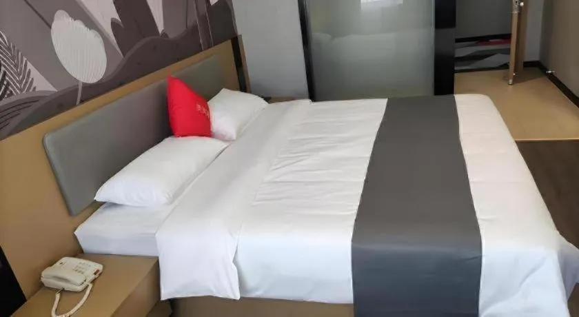 Bed in Thank Hotel Shandong Linyii Pingyi County Commerce and Trade City