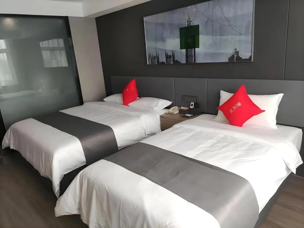 Bed in Thank Hotel Shandong Linyii Pingyi County Commerce and Trade City