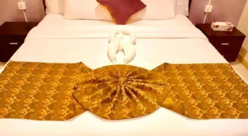 Bed in Lotus Furnished Hotel Apartments LLC. Ajman