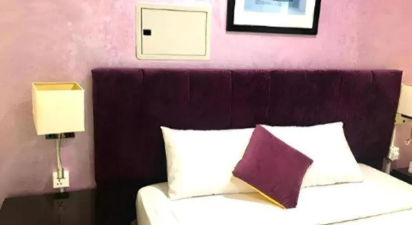 Bed in Lotus Furnished Hotel Apartments LLC. Ajman