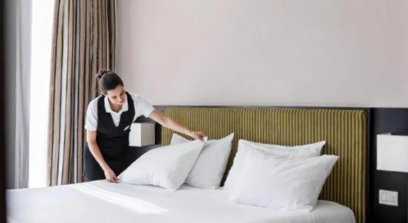 Bed in Lotus Furnished Hotel Apartments LLC. Ajman