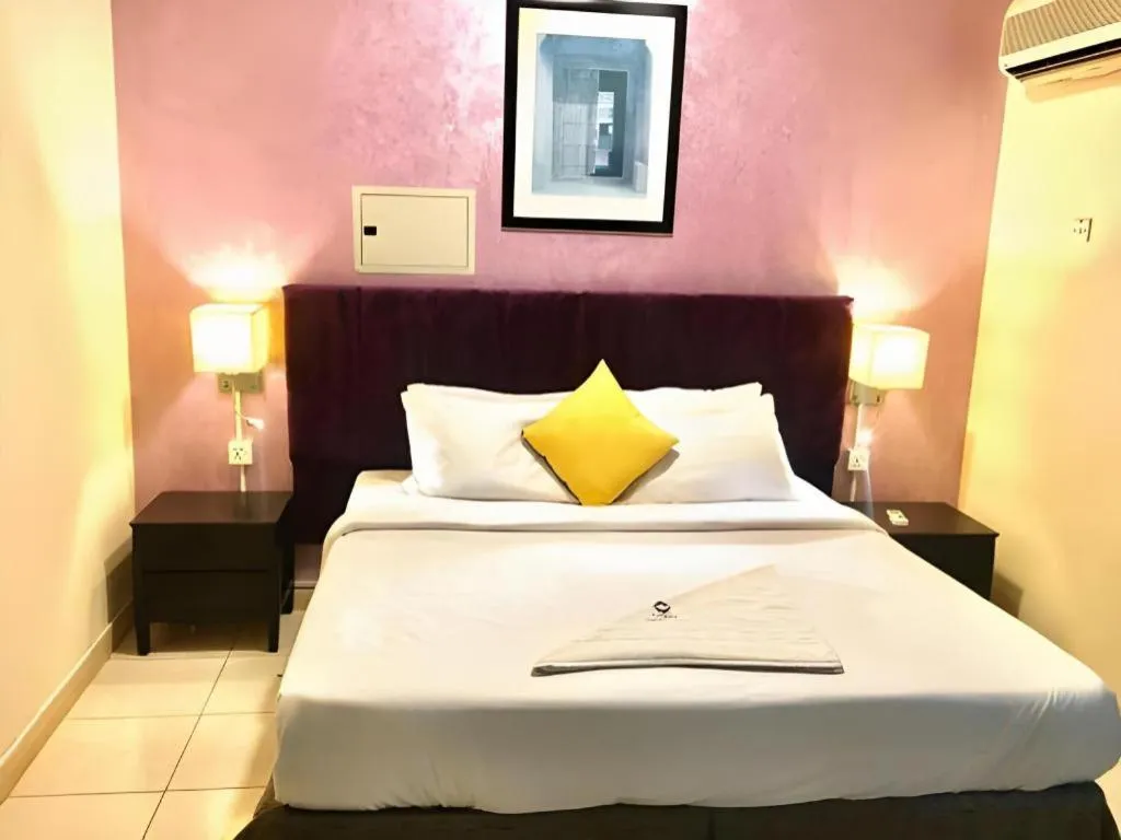 Bed in Lotus Furnished Hotel Apartments LLC. Ajman