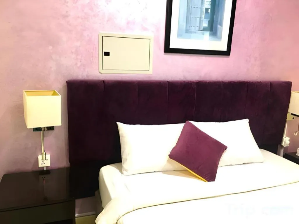 Bed in Lotus Furnished Hotel Apartments LLC. Ajman