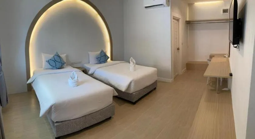 Bed in Thong Prachok Hotel