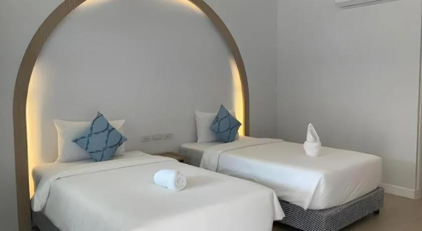 Bed in Thong Prachok Hotel