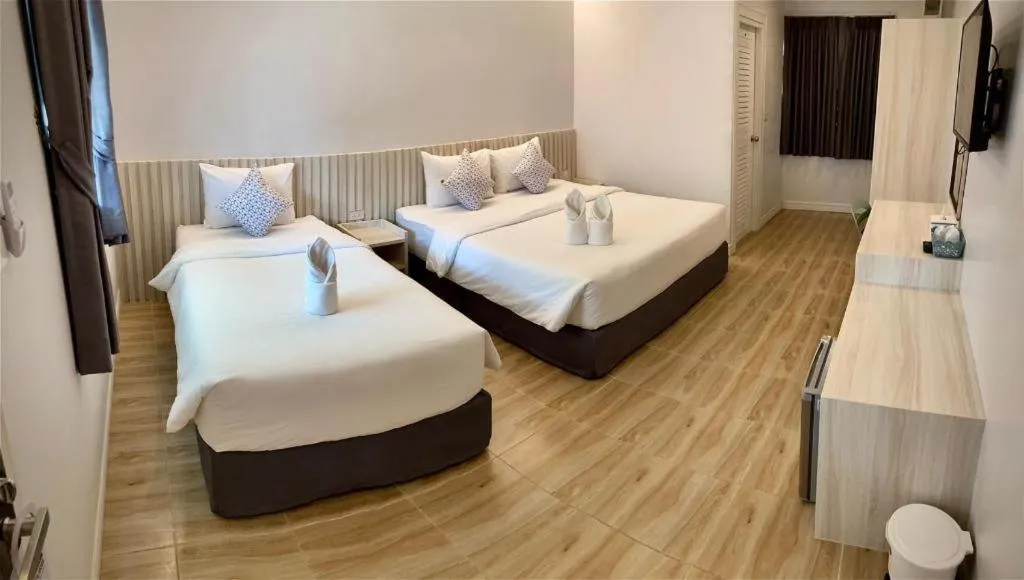 Bed in Thong Prachok Hotel