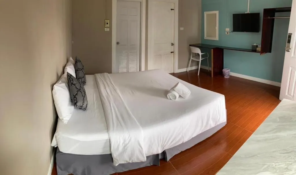 Bed in Thong Prachok Hotel