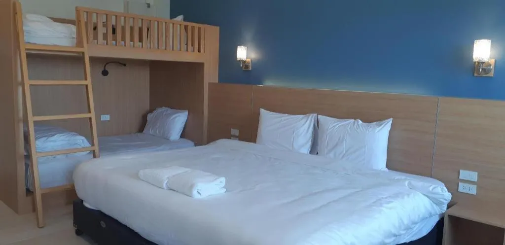Bed in Ceniq Hotel