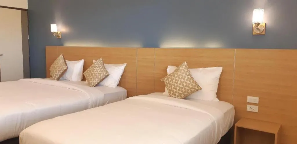 Bed in Ceniq Hotel