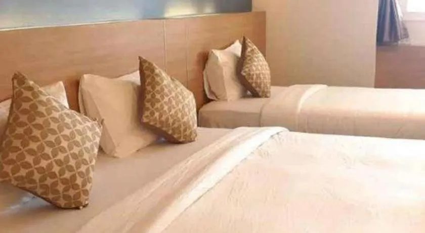 Bed in Ceniq Hotel