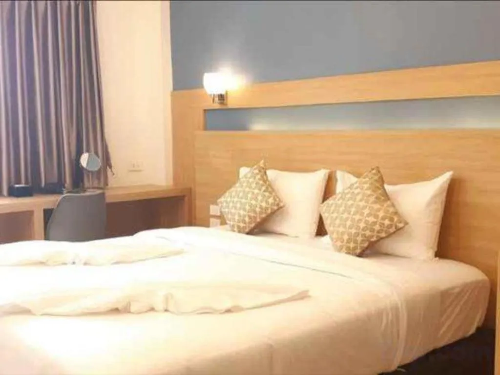 Bed in Ceniq Hotel