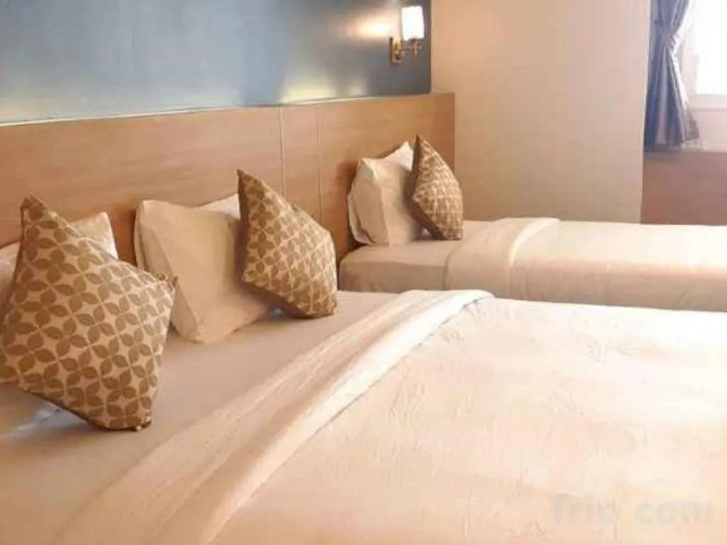 Bed in Ceniq Hotel
