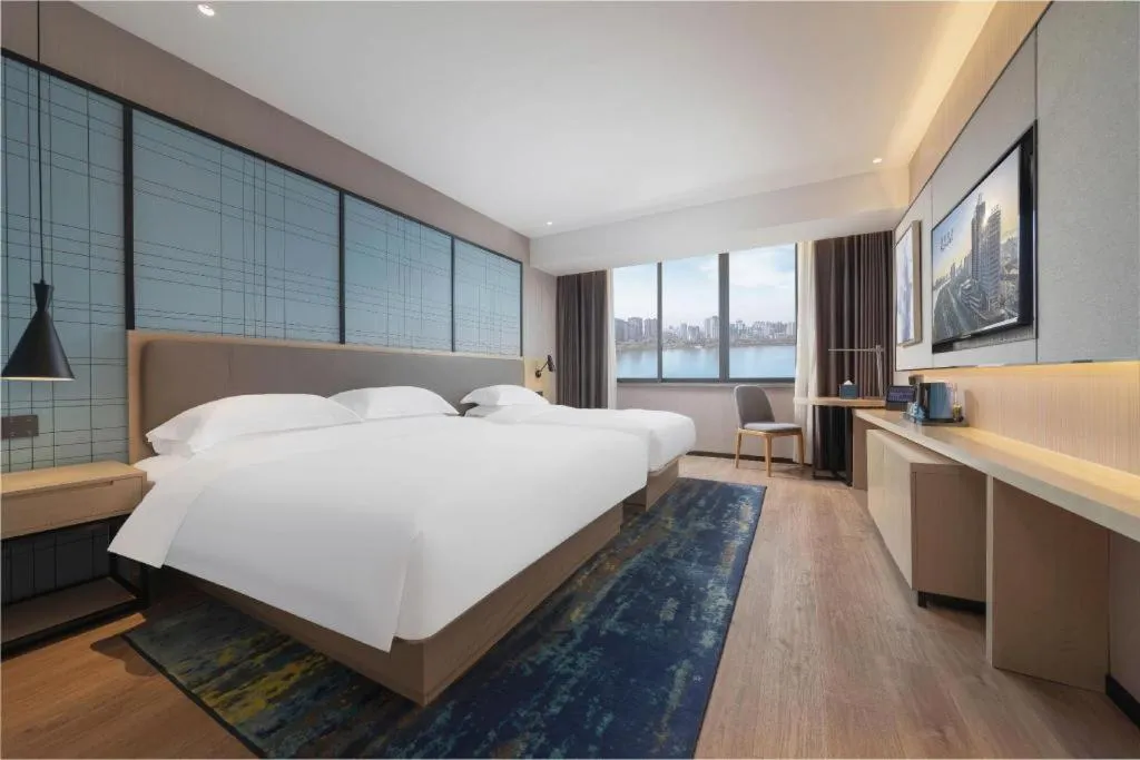 Bed in Echarm Hotel Hanzhong Wetland Park