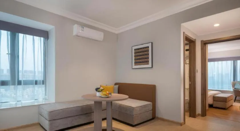 Bed in Poltton International Service Apartment Shanwei Urban District High-speed Railway Station